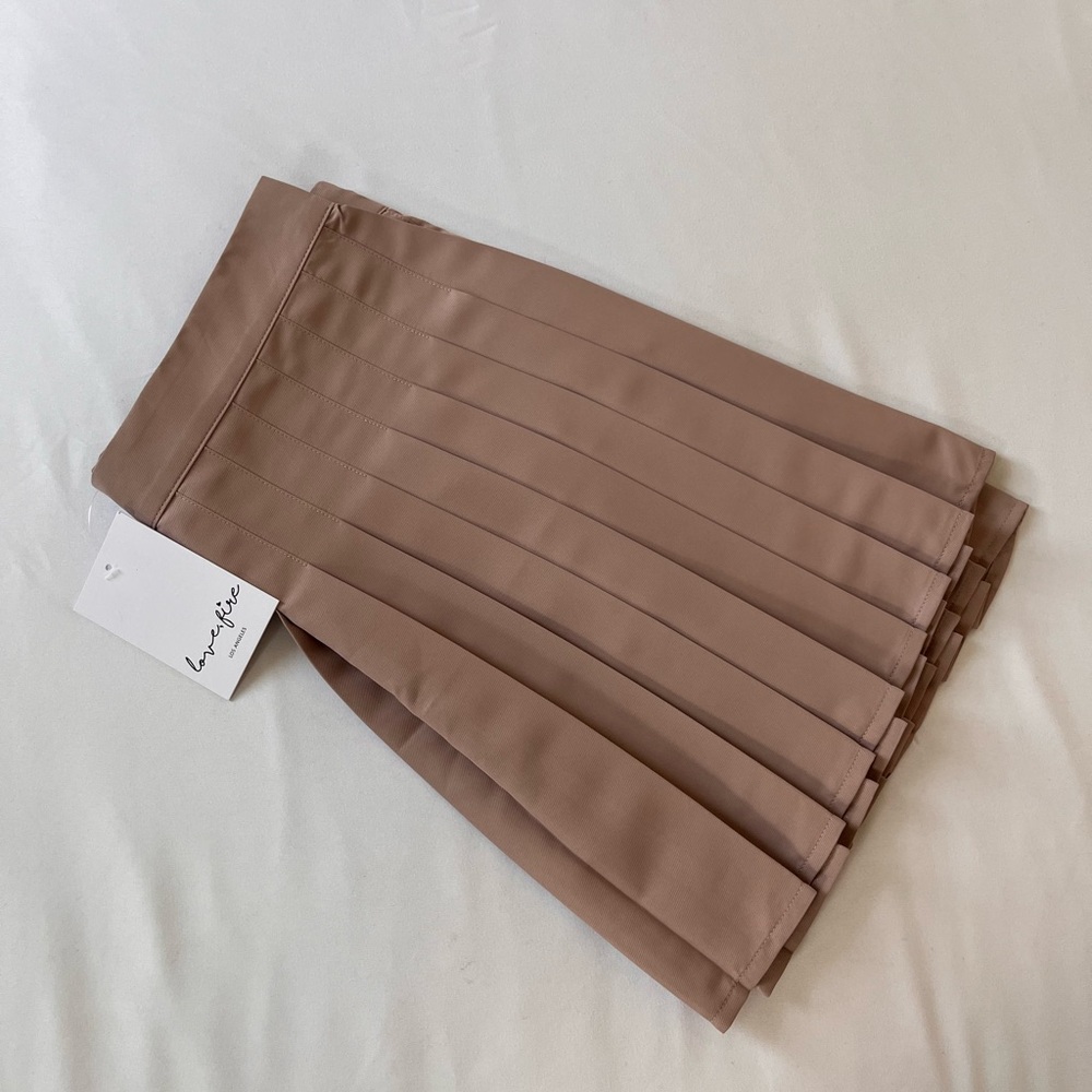 NEW PURPLE/TAN SKIRT SIZE LARGE (runs like a medium)